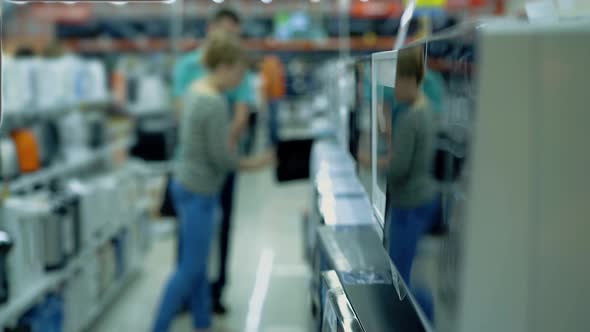 People in the Consumer Electronics Supermarket 3