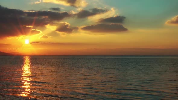 Cloudy Yellow Sea Sunset