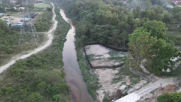 Drone flying towards river in College Height Pajam