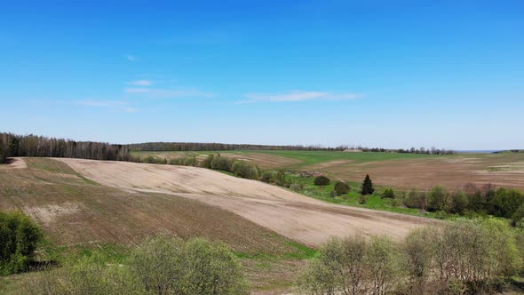 Flying Over Beautiful Summer Landscape Fields and Road Aerial Shot From Drone