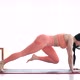 Woman doing abdominal exercises on mat at home. - VideoHive Item for Sale