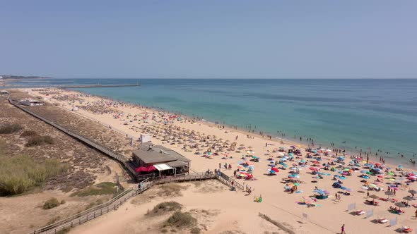 Aerial Video Beautiful Portuguese Beaches Near the Tourist Town Vilamoura Falesia with a View of the