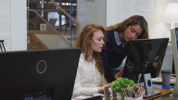 Businesswomen working on computer in office