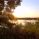 Colorful and Dramatic Sunset Over a Natural Forest Lake Landscape - VideoHive Item for Sale
