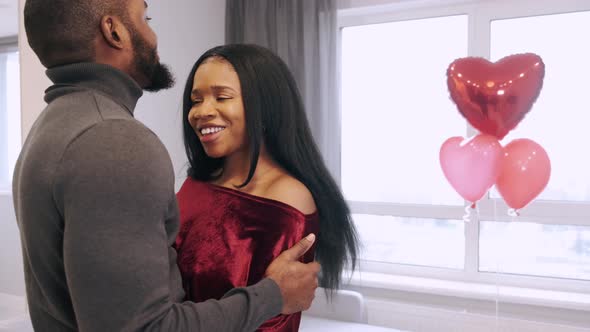 African American Young Couple Celebrating Valentine's Day at Home