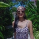 Asian Girl In Swimming Suit Walking Alone In Resort On Sunny Day in Slow Motion - VideoHive Item for Sale
