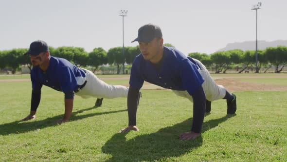 Baseball players making push ups