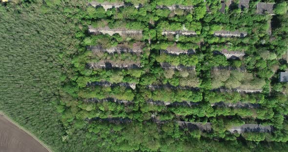 Aerial view of old abandoned pig farm. Livestock farm. Abandoned collective farm