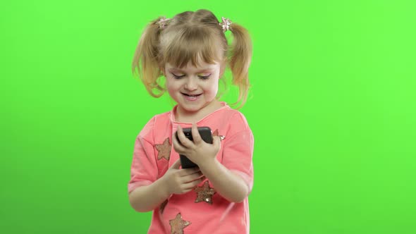 Little Girl Using Smartphone, Portrait of Child with Smartphone Texting, Playing