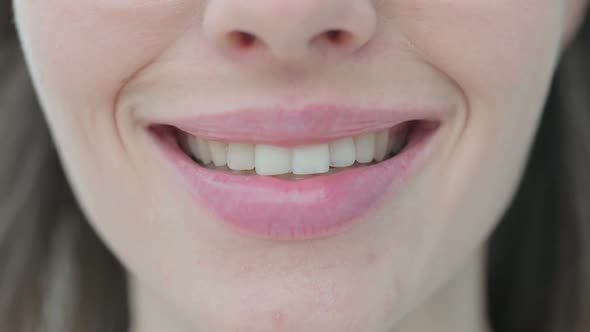 Close up of Smiling Mouth of Young Woman