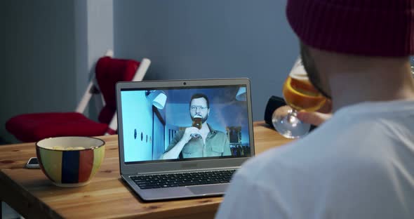 Friends Drink Beer and Go Nuts Online Using a Video Call Keeping Their Distance During the