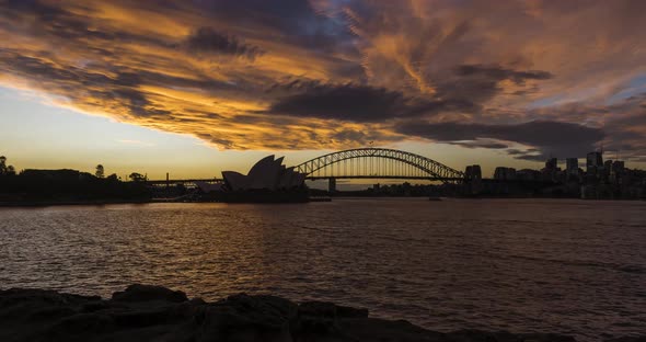 Timelapse of a sunset over Sydney Opera House and Harbour Brigde, Australia