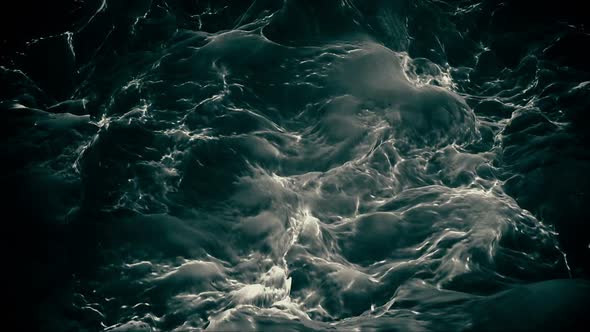 Torrent of Dark Fast Flowing Water Motion Background