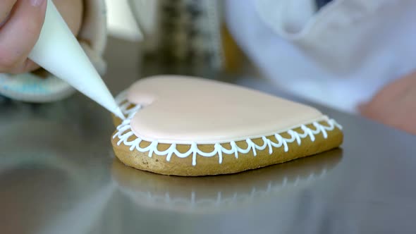 Decoration of Gingerbread Cookie with Pastry Syringe