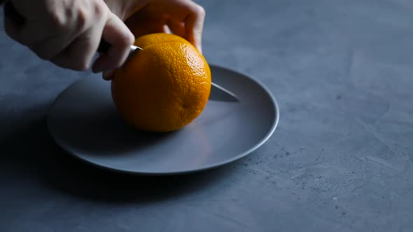 Woman Squeezing Fresh Orange Juice