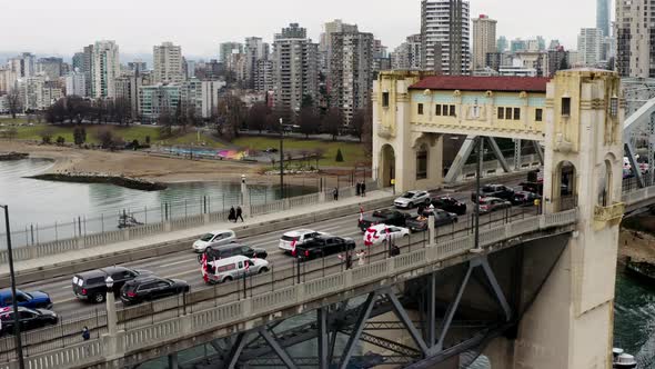 Freedom Convoy - Vehicles With Canadian Flags Lined Up On Burrard Bridge Over False Creek In Vancouv