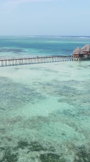 Tanzania  Vertical Video House on Stilts in the Ocean on the Coast of Zanzibar Slow Motion