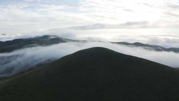 Aerial View of mountains in the clouds, Maluti A Phofung NU, Free, South Africa.