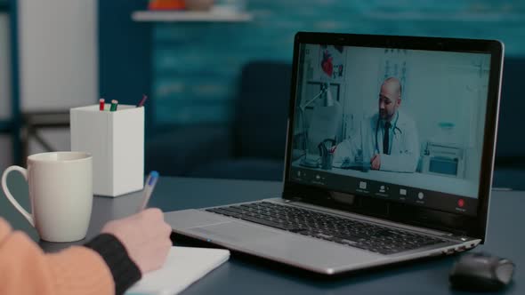 Female Patient Meeting with Doctor on Online Video Call