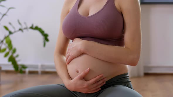 Pregnant Woman Meditating at Home