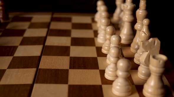 Sliding from one side to the other side of a chess board.