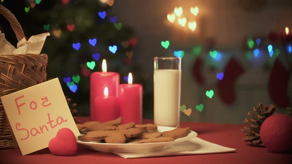 For Santa Note on Table Near Milk and Ginger Cookies, Adorable Family Tradition