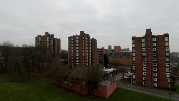 Aerial footage view of high rise tower blocks, flats built in the city of Stoke on Trent to accommod