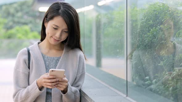 Asian Woman use of cellphone 