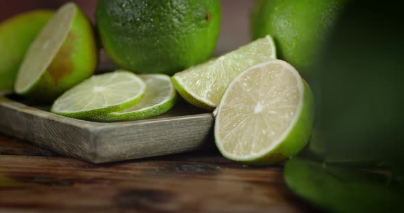 Chopped Pieces of Ripe Lime on the Tray Rotates Slowly