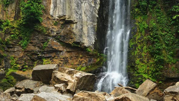 Nauyaca Waterfalls in Costa Rica, Beautiful Landscape and Scenery of a Large Tall Rainforest Waterfa