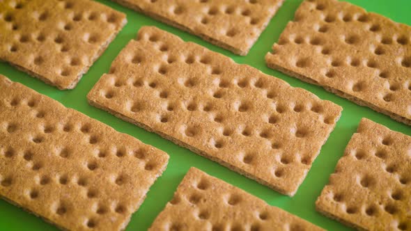 Delicious and Crispy Dietary Bread on the Green Table