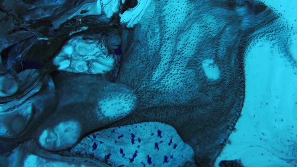 Slow Motion Blue And Black Color Mixing Texture alt