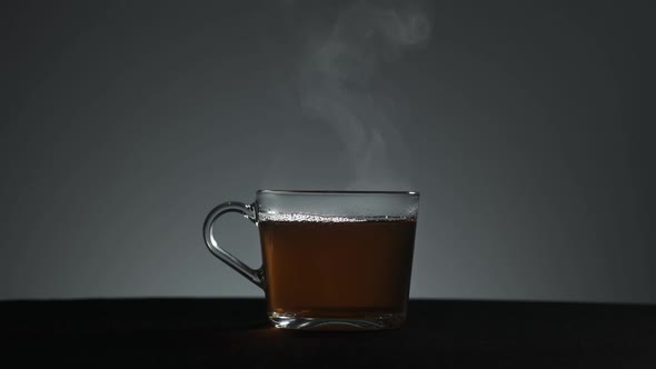 Steam Comes From a Transparent Mug of Tea