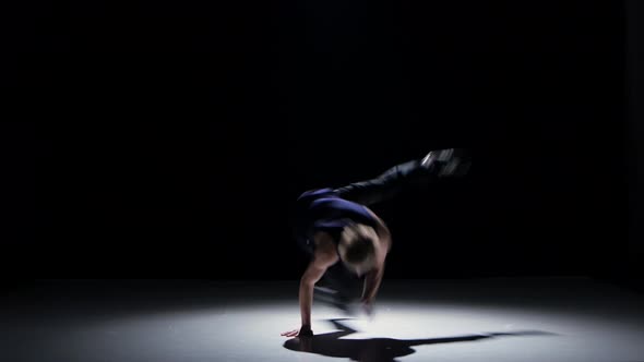 Breakdance Blonde Dancer in Black Suit Starts Dance on Black, Shadow