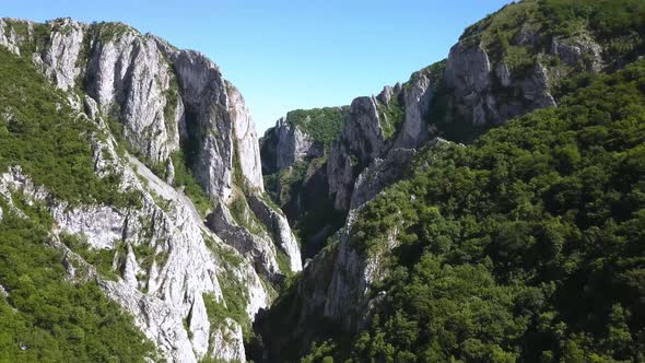 Amazing aerial view of Turda Gorge. Steep grey cliffs and the narrow canyon of this nature preserve