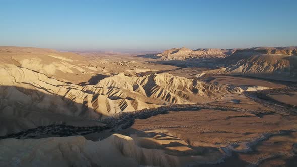 Aerial footage at Sde Boker, in Neguev desert of Israel. Dry river in the desert landscape.