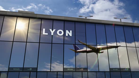 Airplane landing at Lyon France airport mirrored in terminal