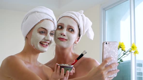 Beautiful Woman Having a Facial Treatment at Spa