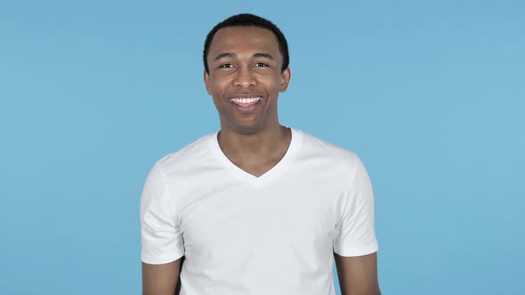 Online Video Chat By Young African Man Blue Background