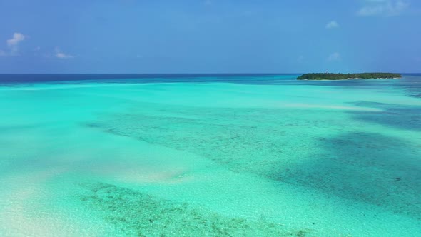 Aerial above texture of relaxing tourist beach vacation by clear sea and white sand background of a 