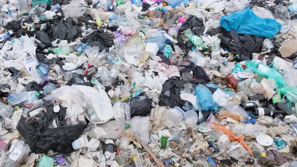 The Camera Removes a Closeup of a Mountain of Garbage Unsorted Waste