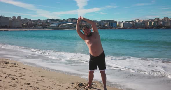 An Overweight Man Does Morning Exercises for a Healthy Lifestyle