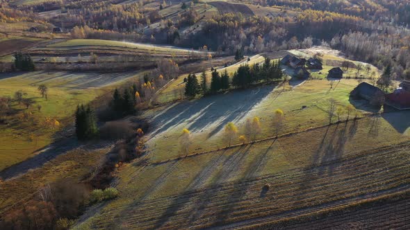 Aerial View Over Autumn Landscape, Hills and Countryside Homestead Farm
