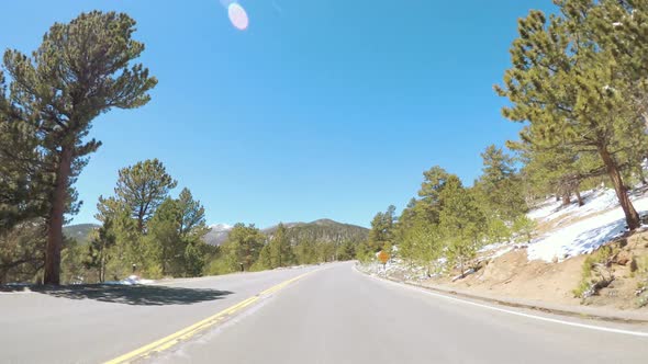 POV point of view -Driving through Rocky Mountain National Park in the Spring.