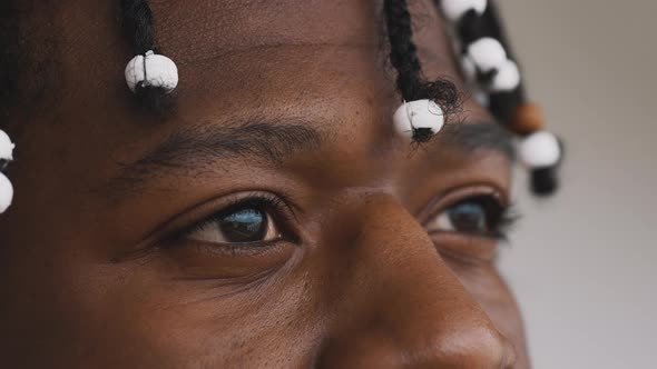 Close Up Eyes of Happy Affrican American Black Man with Dreadlocks Smiling