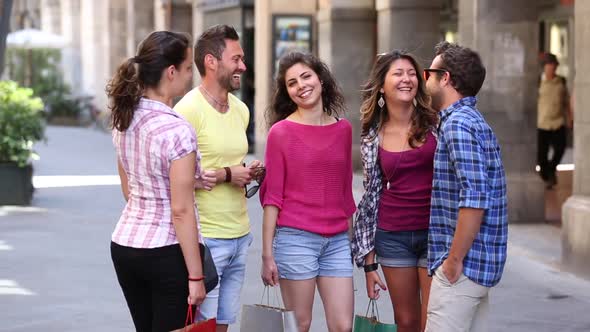 Group of friends meeting in the city and talking