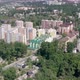City Buildings Between Green Trees - VideoHive Item for Sale