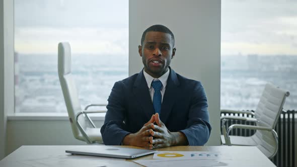 Young african american businessman communicating by video call