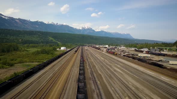 Mining facility in a vast mountain range.