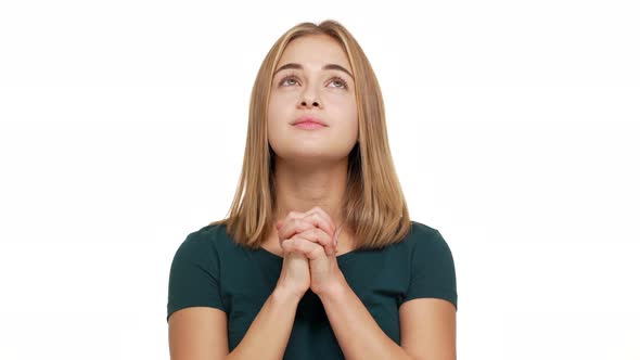 Portrait of Woman Looking Up with Keeping Hands in Praying Begging God Please Wishing Something